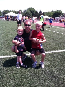 daddy and boys at the track meet